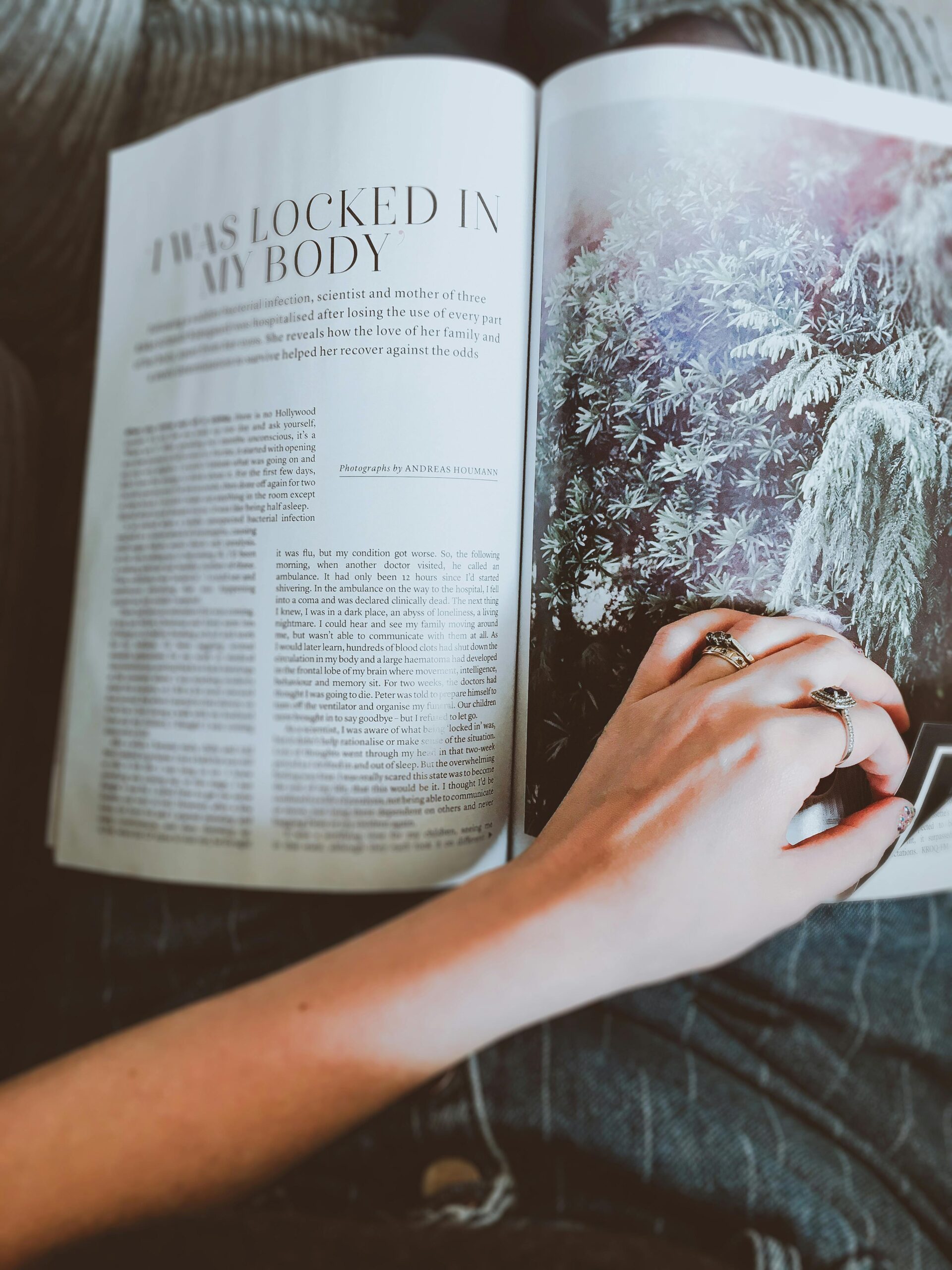 Person flipping through a magazine, representing the published article in the October 2022 edition of Gay Parent Magazine.